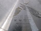 a close up of a circular blade on a metal table