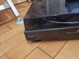 a remote control sitting on top of a black box