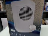 an image of a box with a small fan on top of it