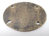 a close up of a metal disc with holes on it
