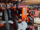 a tractor that is parked in a garage