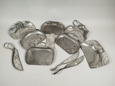 a lot of silver items that are on the table