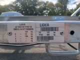 a label on the side of a trailer that says lider