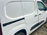 a white van parked on the side of the road