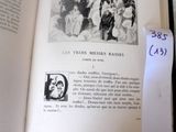 an open book with a picture of a group of people on it
