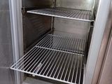 an open refrigerator with a lot of food inside of it