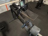 a machine that is sitting on the floor in the gym
