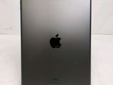 the back of an apple ipad with a small black apple logo on it