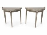 pair of side tables in the manner of person
