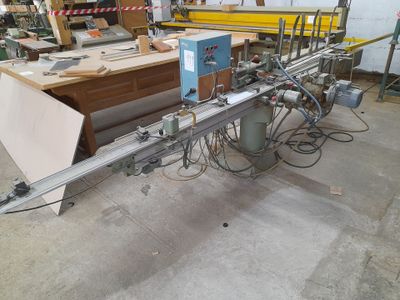 a picture of a machine that is working on a piece of wood