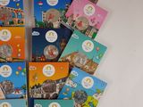 several children ' s books are arranged in a circle on a table