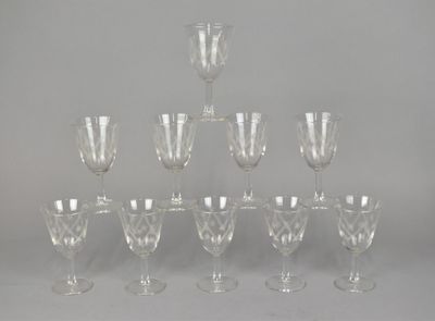 a lot of wine glasses sitting on a table