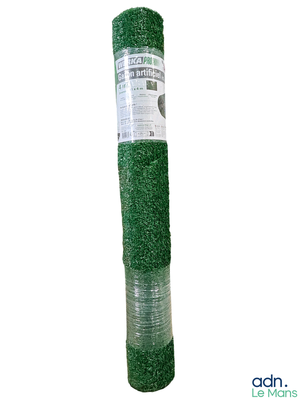 a close up of a roll of green grass on a white background