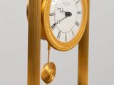 a clock that is sitting on top of a table