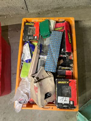 a box full of assorted items sitting on the floor