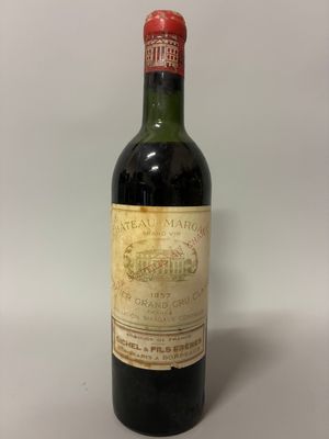 a close up of a bottle of wine on a table