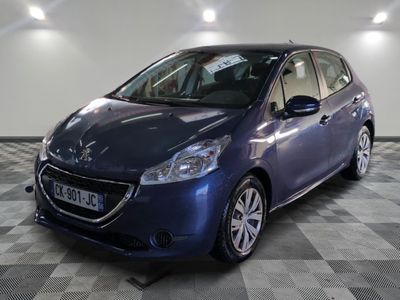 a picture of a blue car parked in a garage