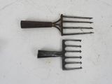 four different types of garden tools on a white surface