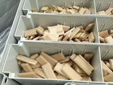 a box full of wooden pieces in the back of a car