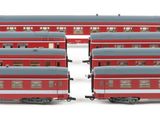 four red and gray train cars sitting next to each other on a white surface
