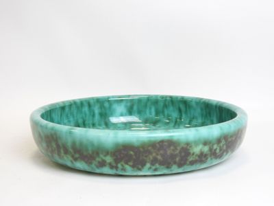 green and brown bowl on a white background