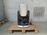une cafetière posée sur une palette