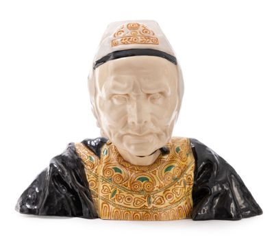 a figurine of a man with a hat on his head