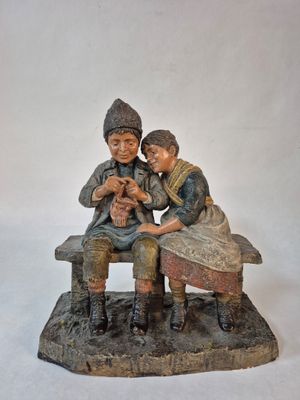 DEPONIRT Groupe en terre cuite polychrome figurant deux enfa…