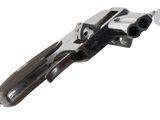 a close up of a gun on a white background