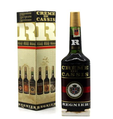 a close up of a bottle of liquor next to a box
