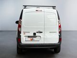a white van that is parked in a room