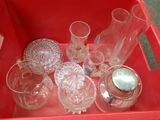 a lot of glass items sitting in a red box