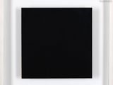 an empty white frame with a black square in the middle