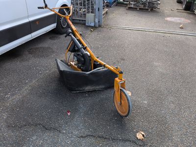 a bike that is sitting in the middle of a parking lot
