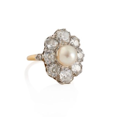 an antique pearl and diamond cluster ring