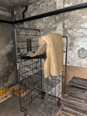 a metal rack with a towel on top of it