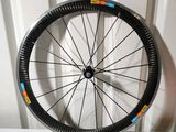 a bicycle wheel with a colorful sticker on it