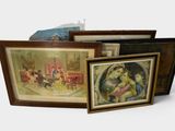 three framed pictures of a woman and a child in a living room