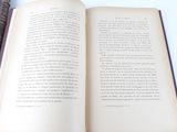 an open book that is sitting on a table