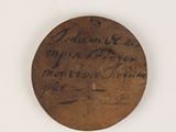 a picture of a piece of wood with writing on it