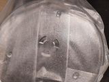 an image of a plastic fireman ' s helmet on a table