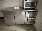 a microwave sitting on top of a counter in a kitchen