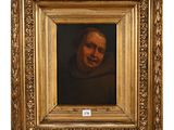 un tableau représentant un vieil homme, dans un cadre doré