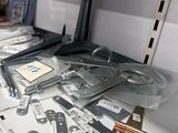 many different types of electronic equipment on the shelf