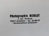 a close up of a plate with a black and white photo on it