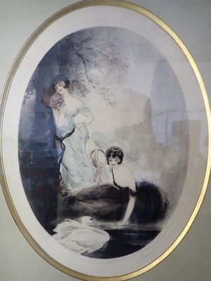 une photo d'une femme et d'un chien dans un cadre