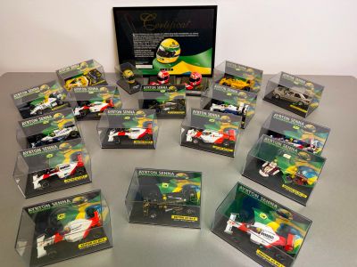 a lot of toy cars that are sitting on a table