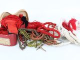 many different types of yarn in a red box