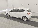 a picture of a white car parked in a garage