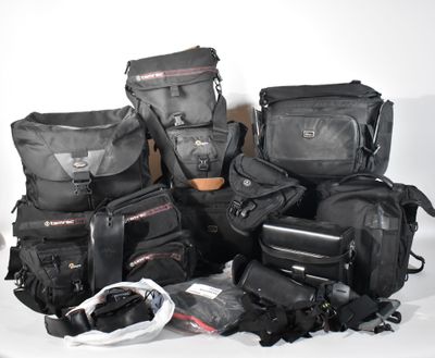 a lot of bags that are sitting on a table